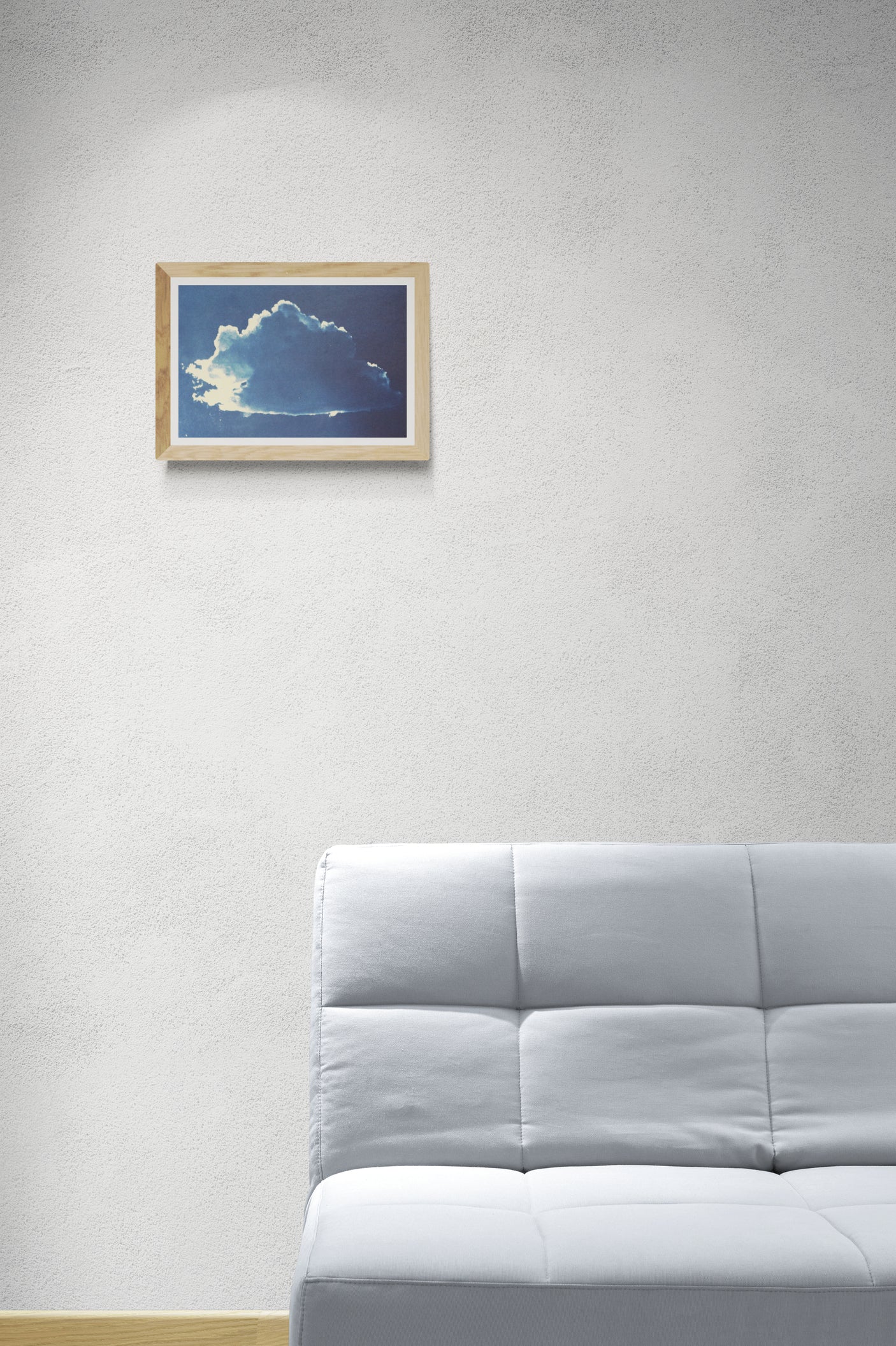 Œuvre encadrée de la collection Cyanotype en mise en situation représentant un nuage bleu.