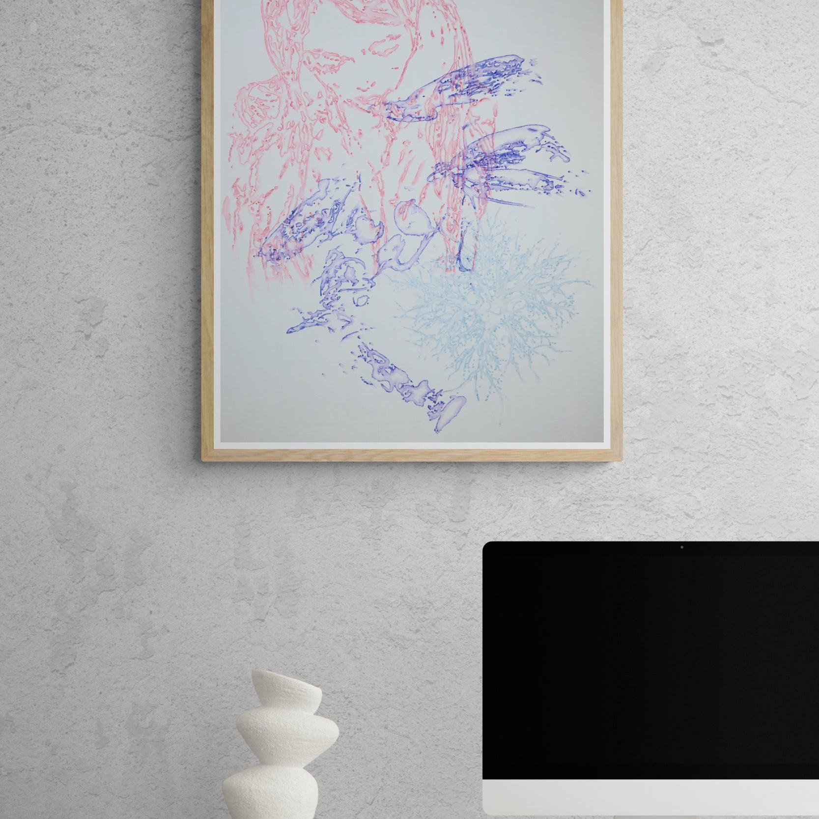 Œuvre de la collection Métamorphe encadrée, aquarelle sur papier, motif de visage entouré de nature, au rendu délicat, présentée en intérieur.