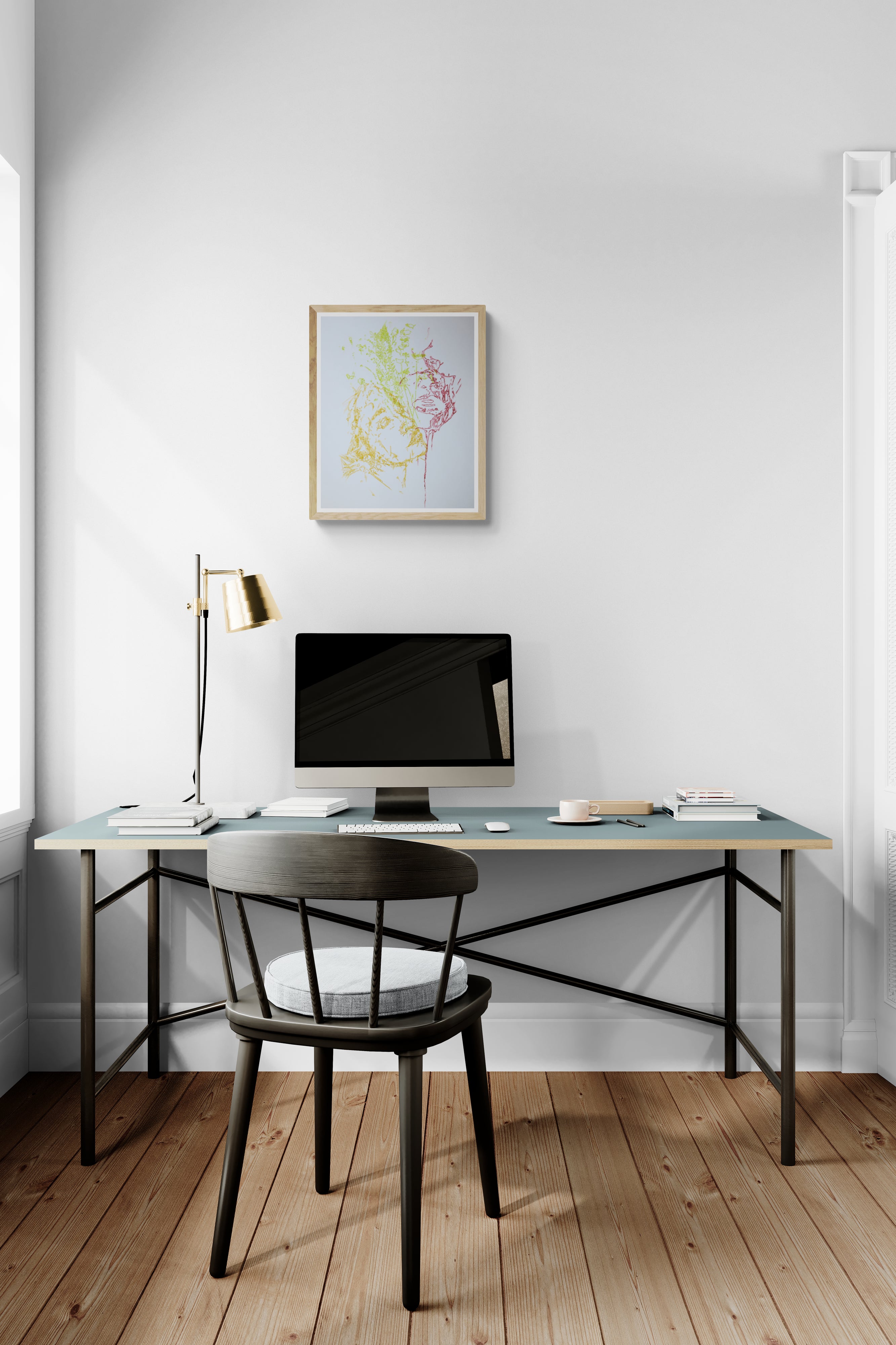 Œuvre de la collection Métamorphe encadrée, aquarelle sur papier, motif de visages entourés de feuillage, au rendu délicat, présentée en intérieur.