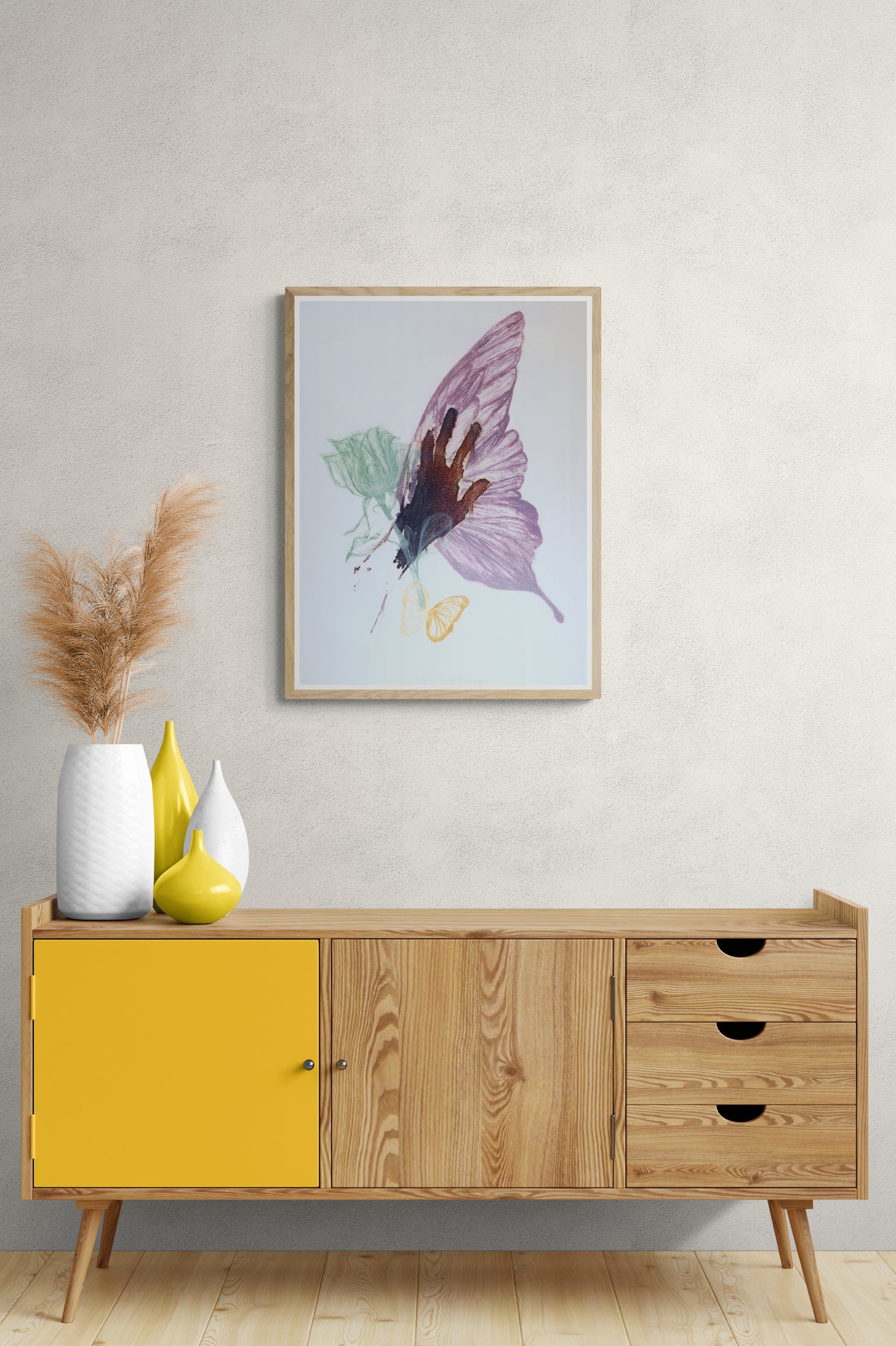 Œuvre encadrée de la collection Spiritus, gravure et image imprimée sur papier, présence de papillons et d’une main, composition expressive, présentée en intérieur.