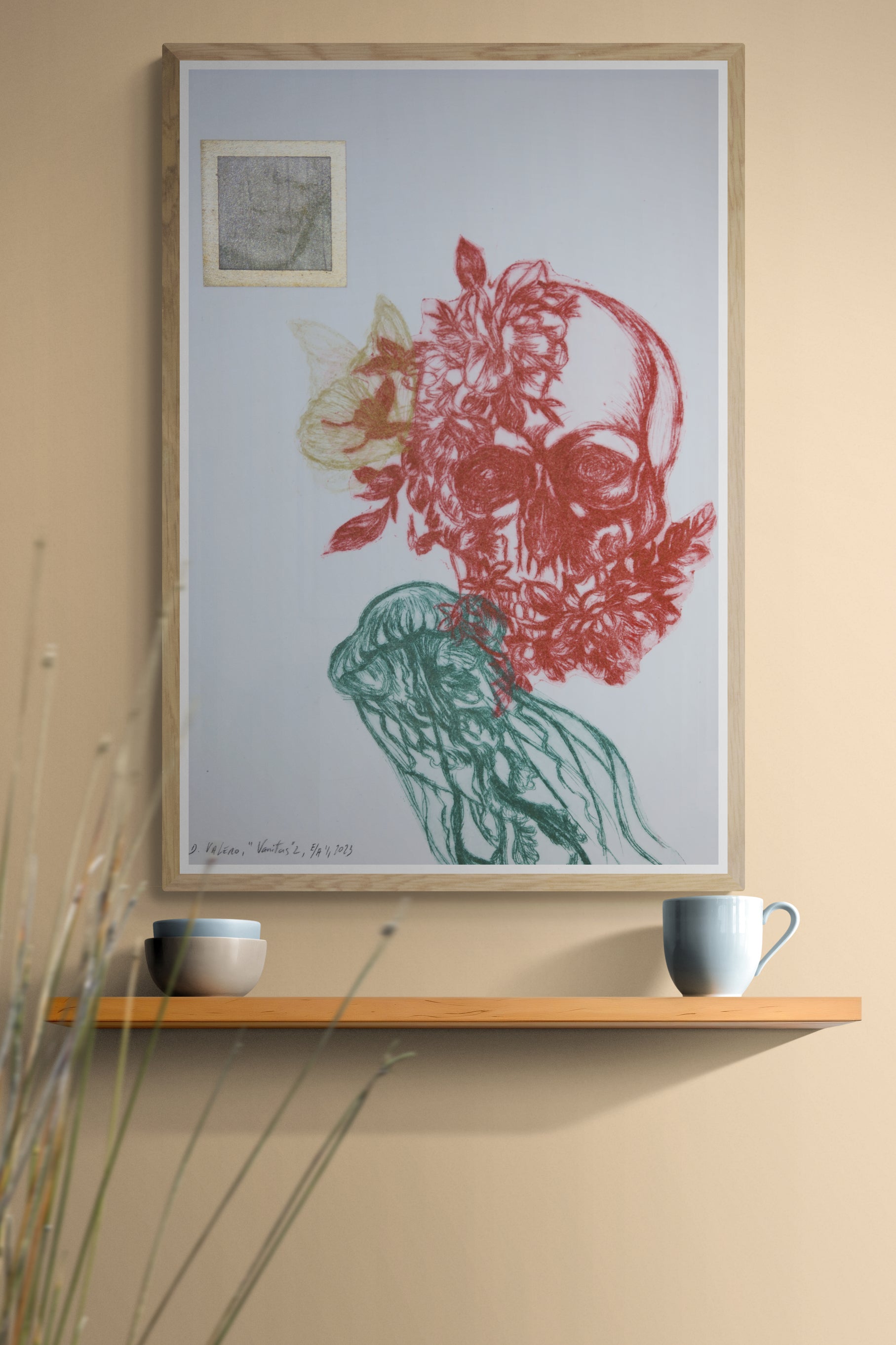 Œuvre de la collection Vanitas, gravure sur papier représentant un crâne, une méduse, une composition florale et un papillon, présentée en intérieur.